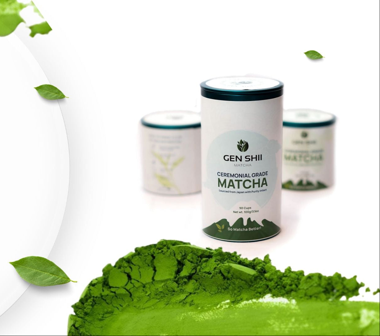Ceremonial grade matcha powder and containers on a white background with green matcha leaves.